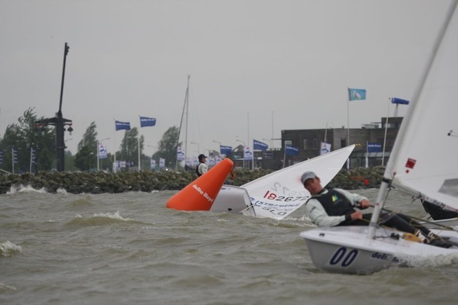 Medal race. Tom Slingsby AUS 192274 takes the lead in these windy conditions as Vasilij Zbogar SLO 182672 has a hard time rounding the mark. © 2008 Thom Touw - Delta LLoyd Regatta 2008 ©  SW